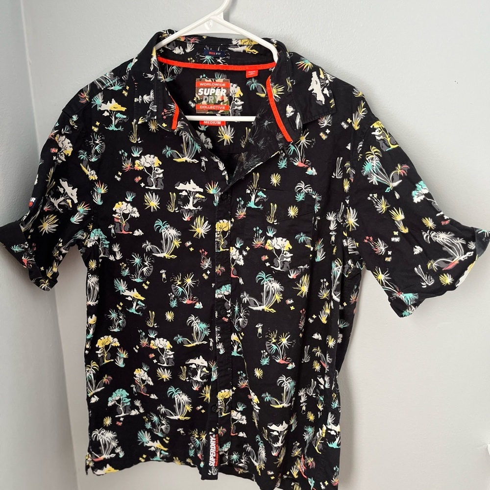 Navy blue with palms trees Size medium short sleeve